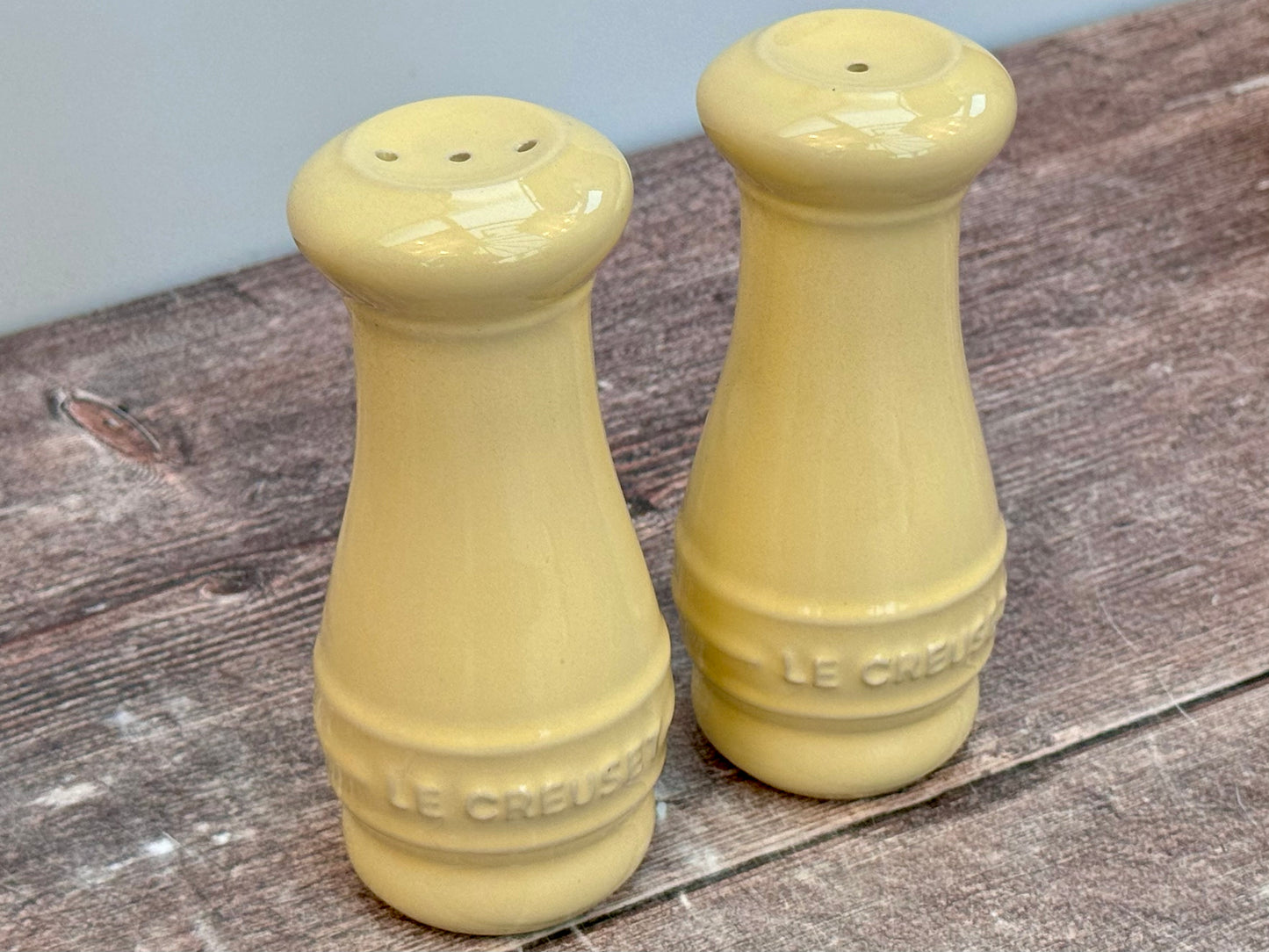 Pale Yellow Le Creuset Salt and Pepper Shakers