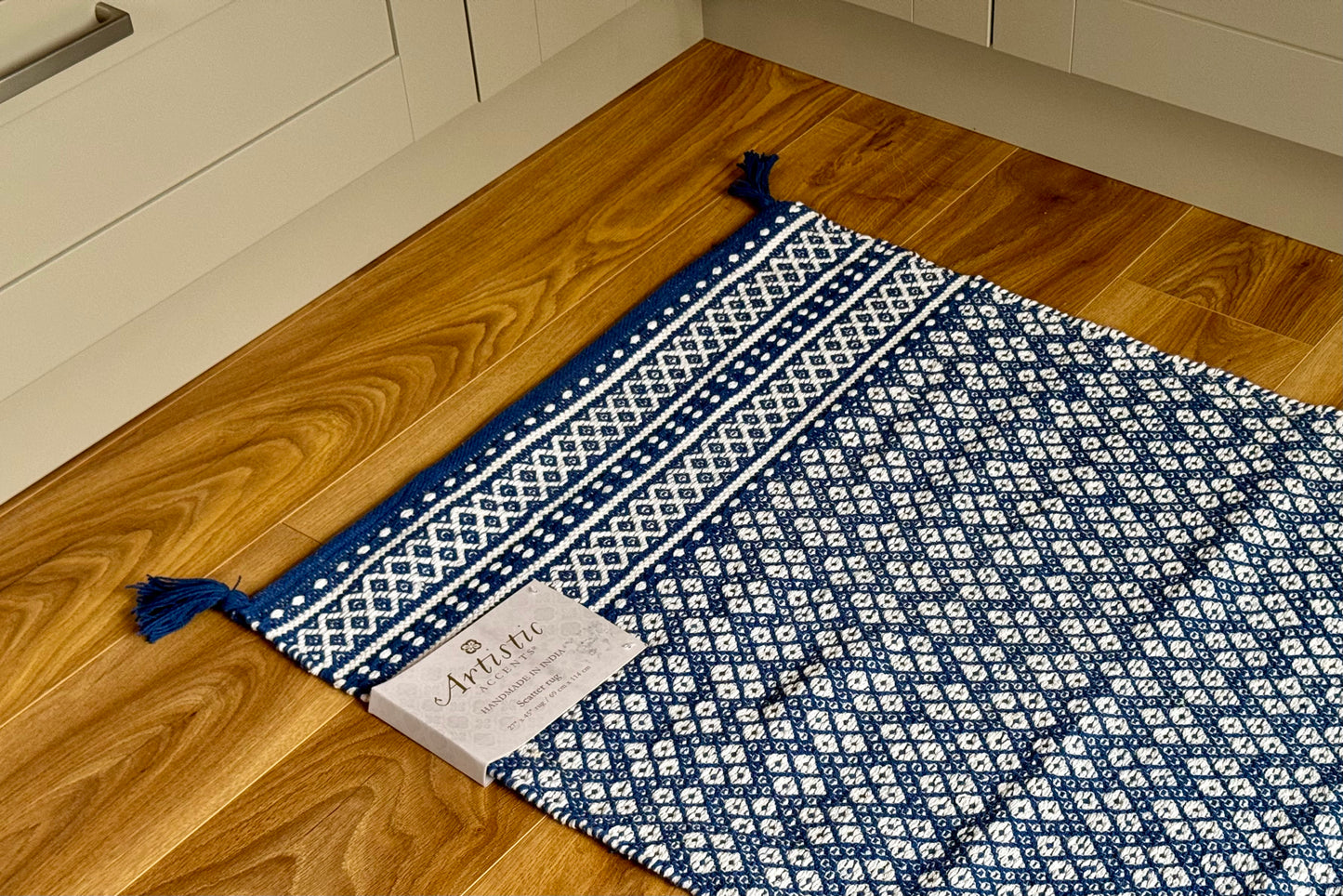 Blue and White Patterned Rug, 69cm x 114cm