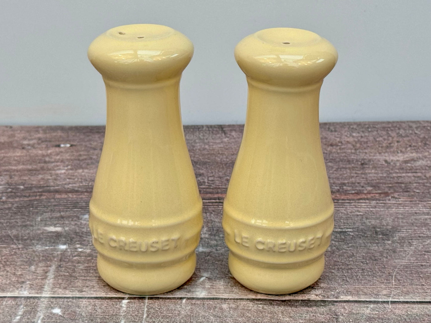 Pale Yellow Le Creuset Salt and Pepper Shakers