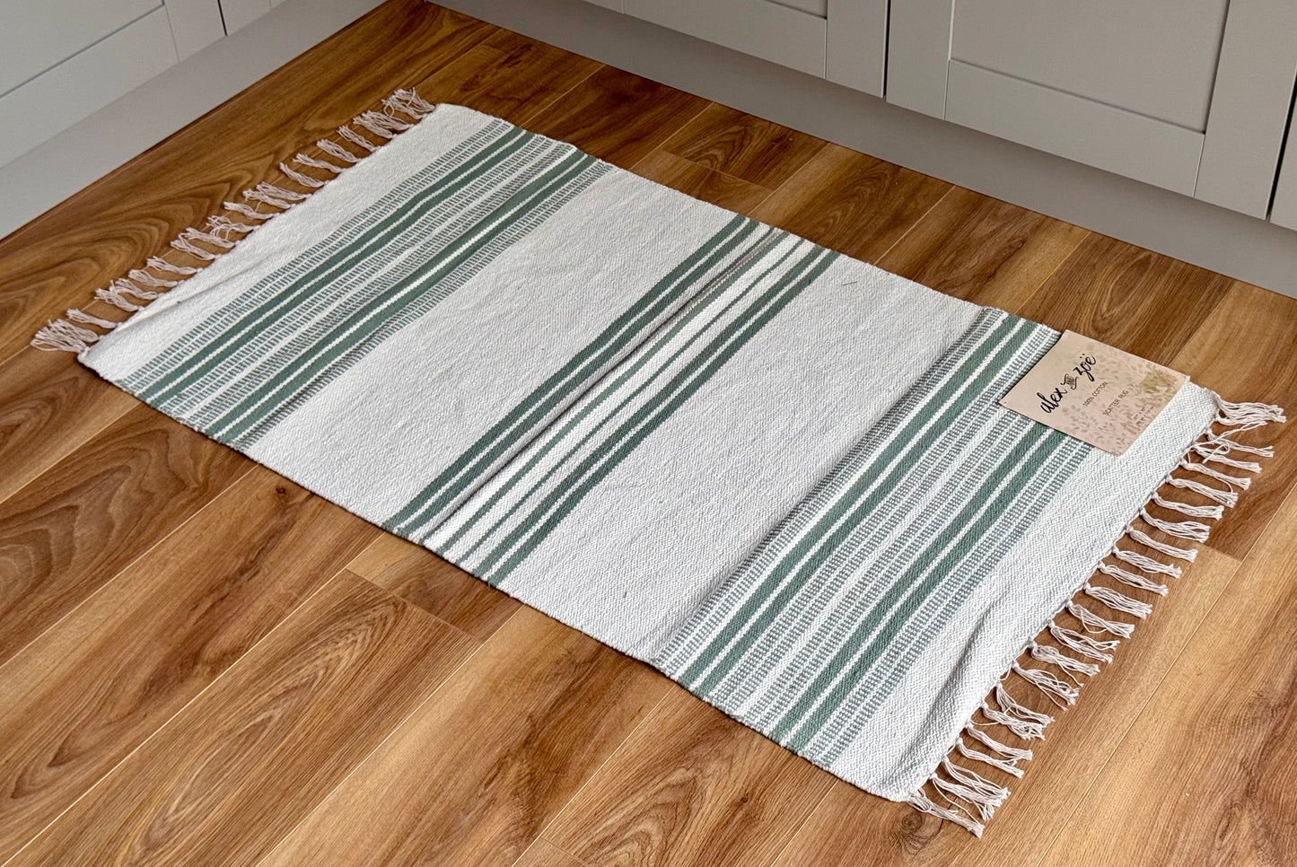 Cream and Green Patterned Rug, 69cm x 114cm