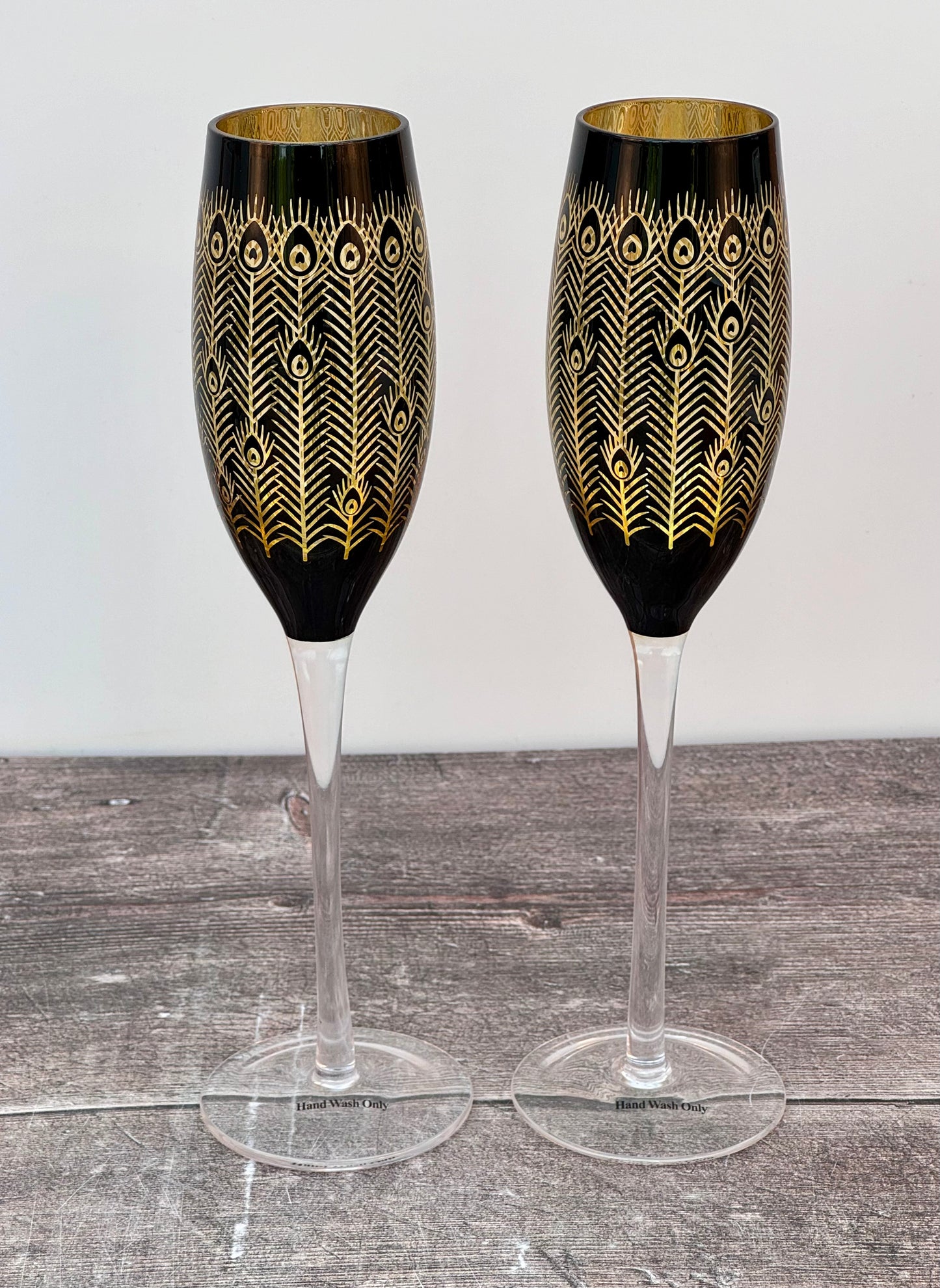 Set of 2 Black and Gold Peacock Patterned Champagne Flutes