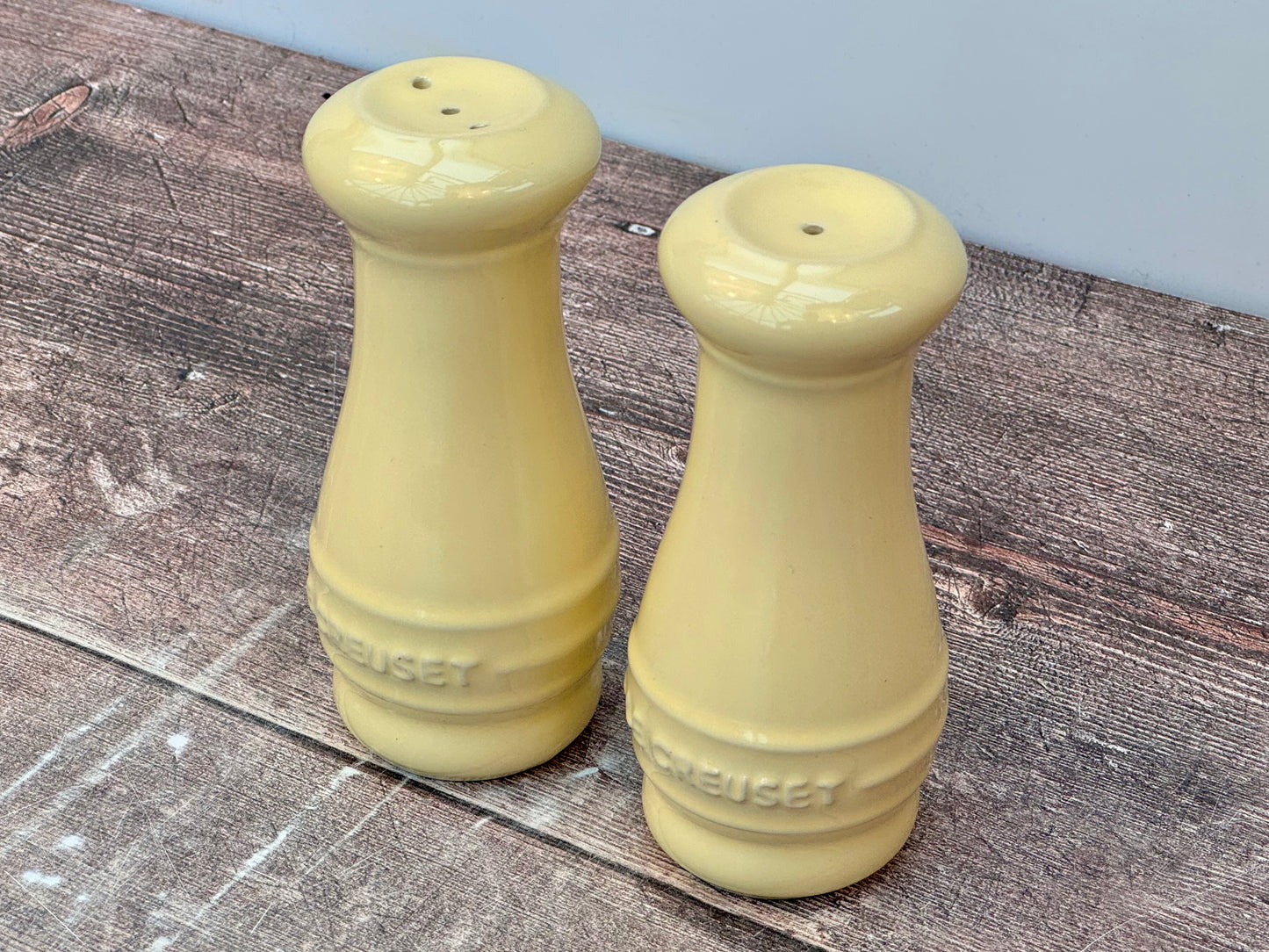 Pale Yellow Le Creuset Salt and Pepper Shakers