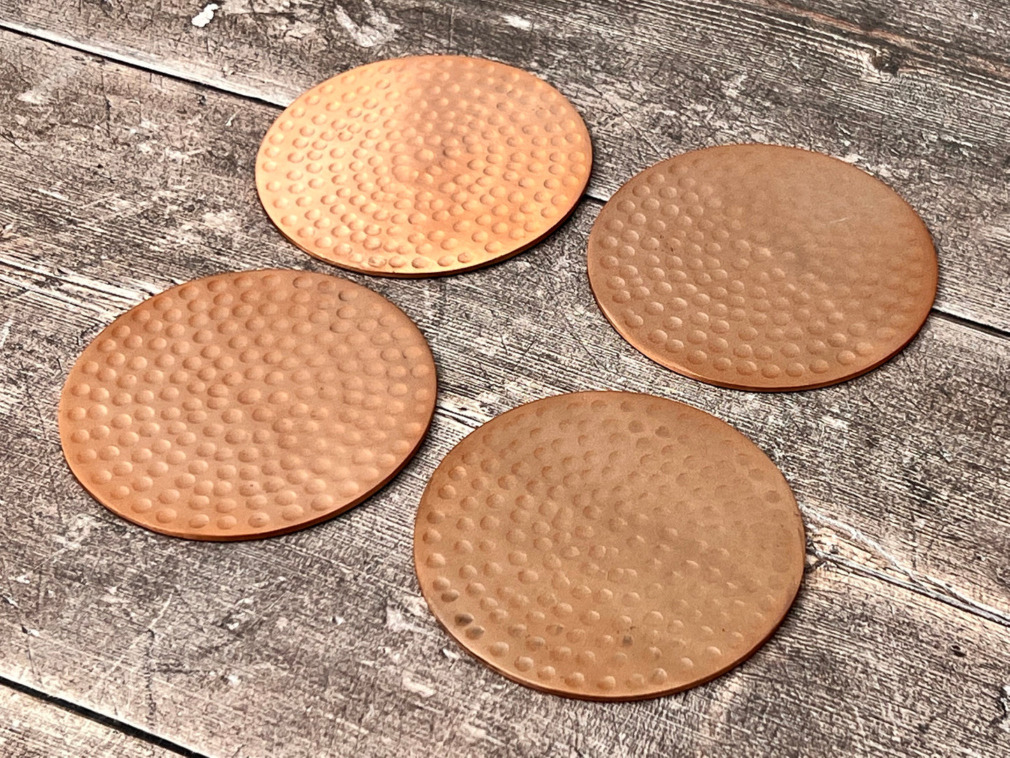 Set of 4 Copper Tone Hammered Coasters