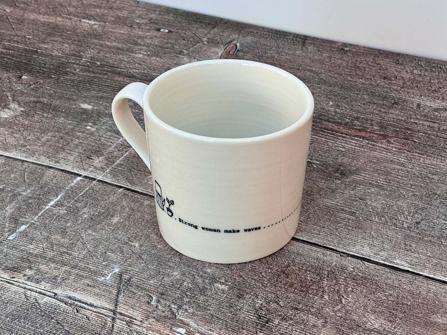 White ‘Strong women make waves’ Mug