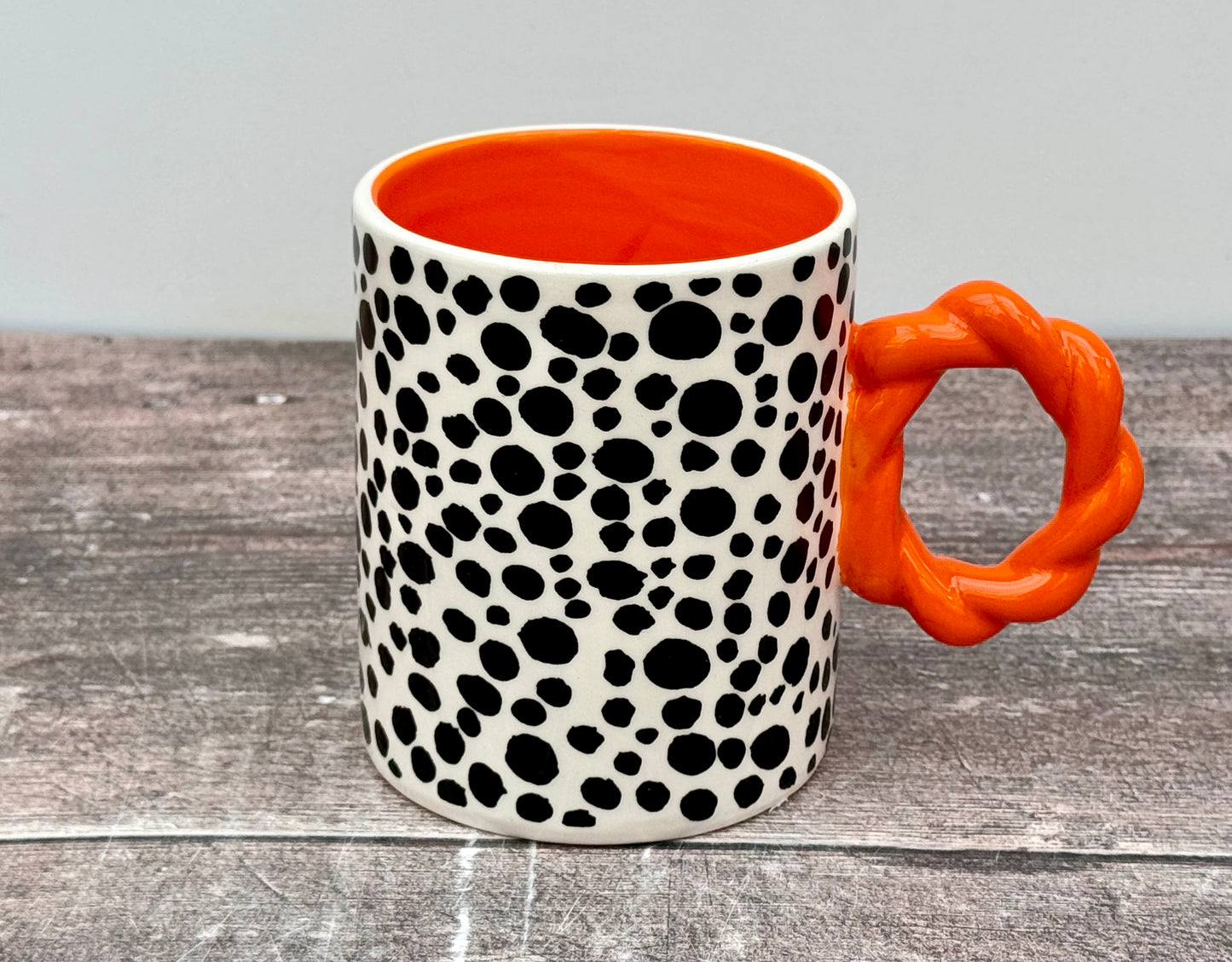 Orange, Black and White Spotted Handpainted Mug